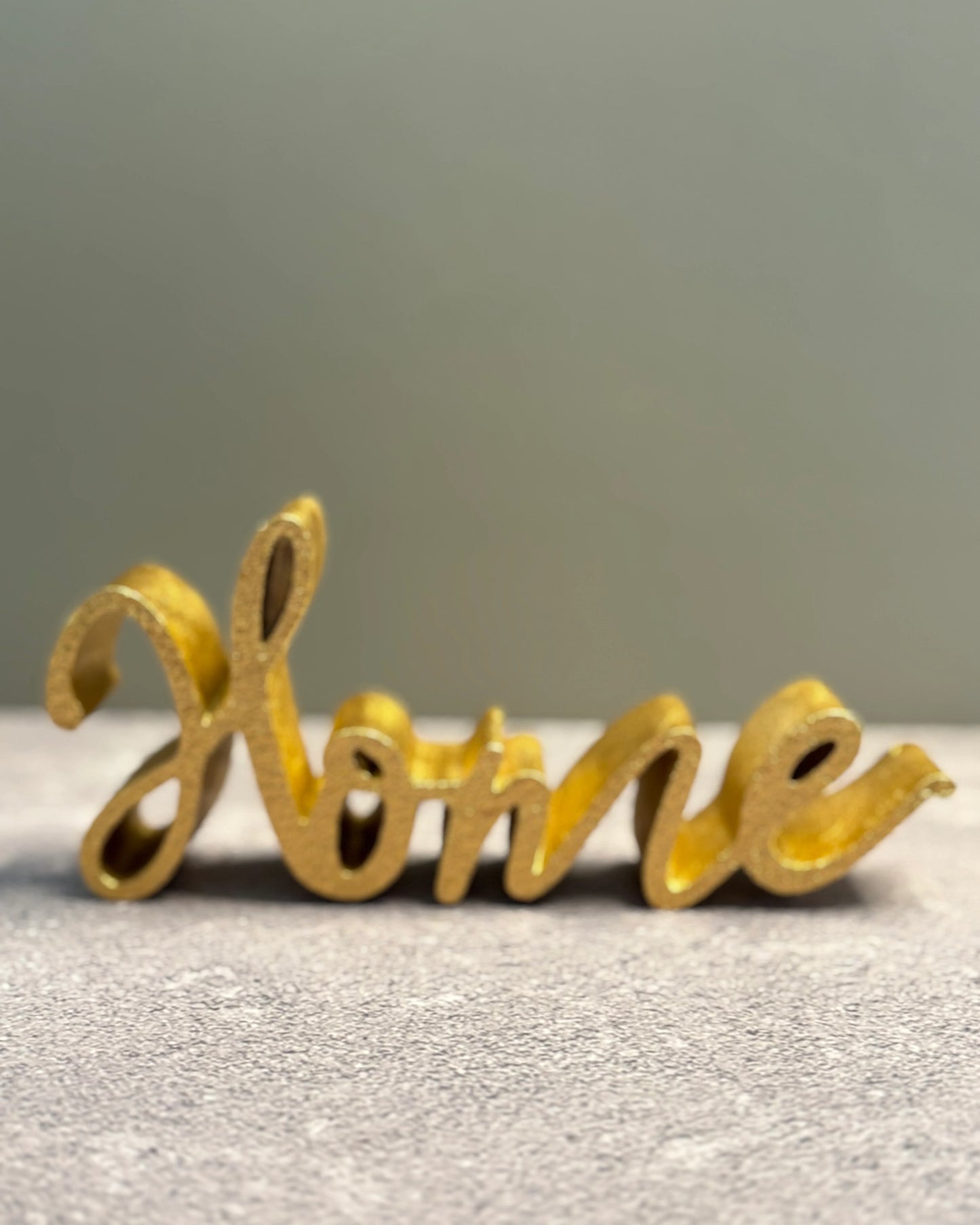 Figura Dorada Decorativa Home