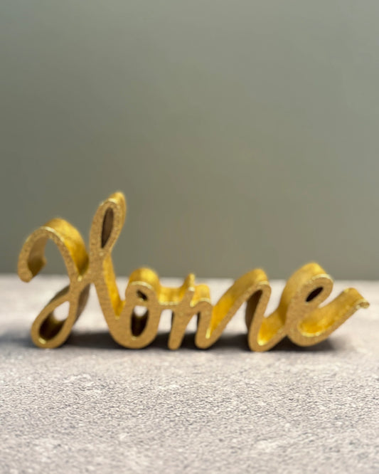 Figura Dorada Decorativa Home