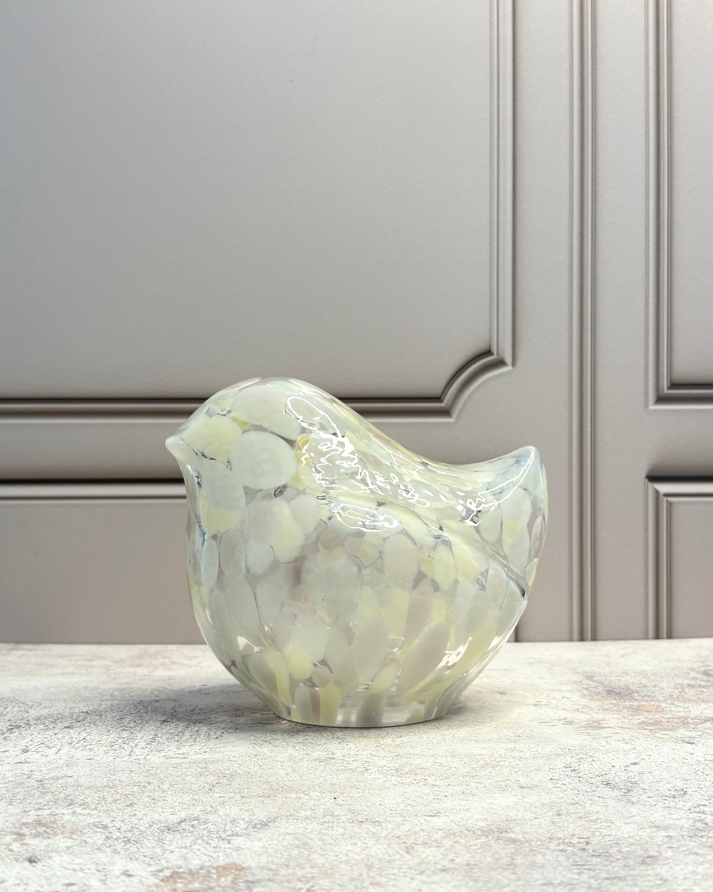Figura decorativa de vidrio ave jaspeada