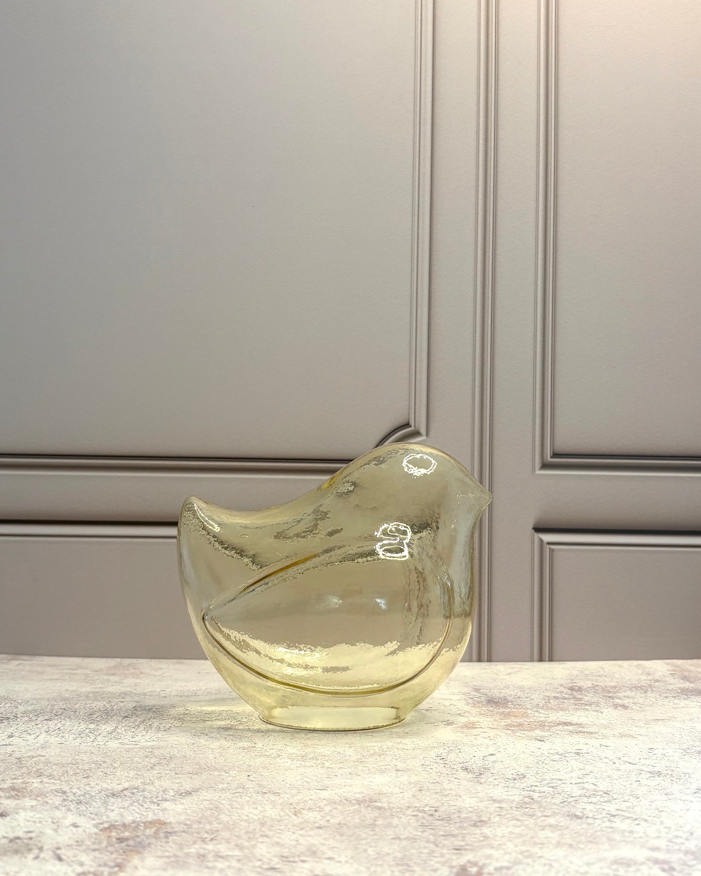 Figura decorativa de ave en vidrio