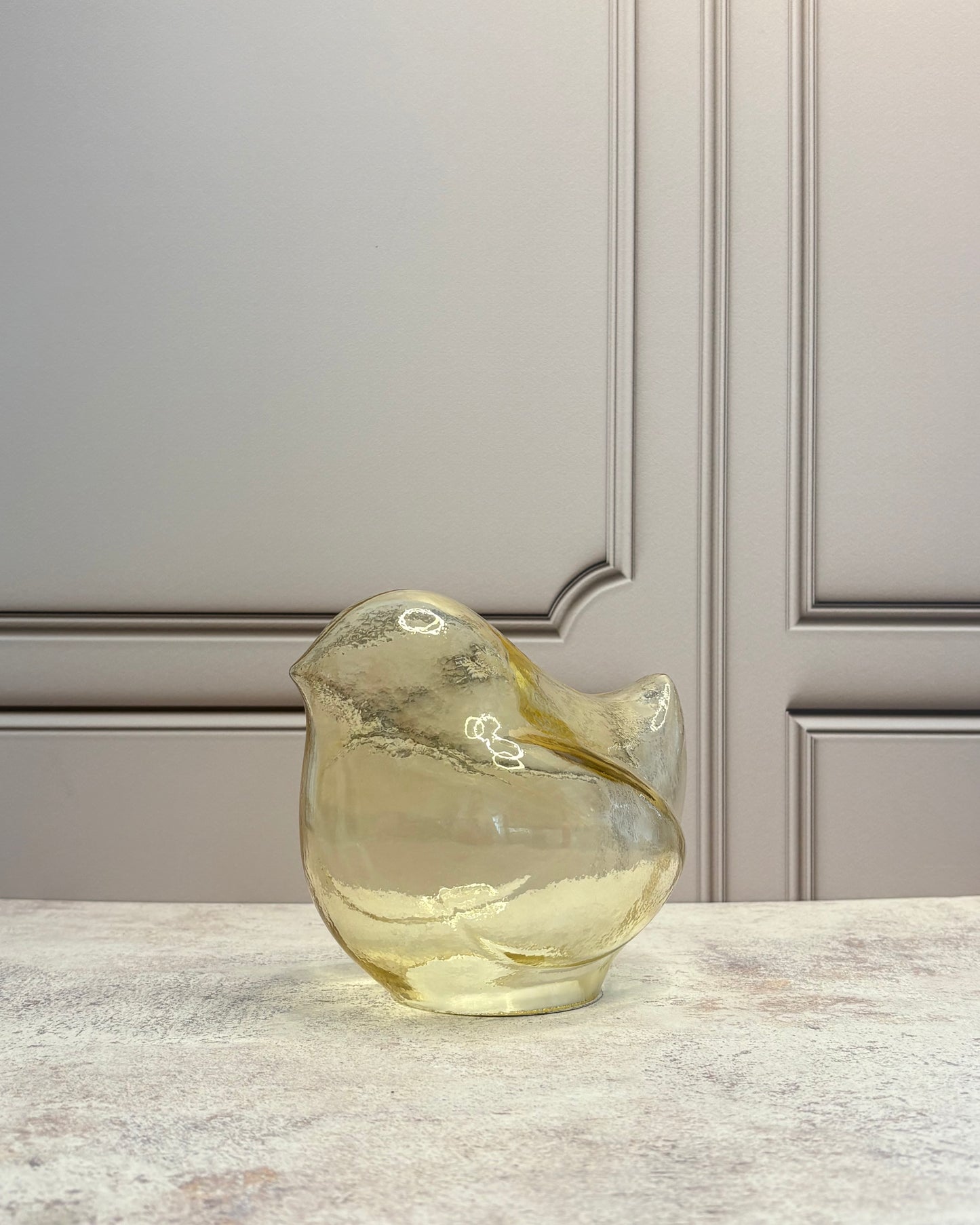 Figura decorativa de ave en vidrio