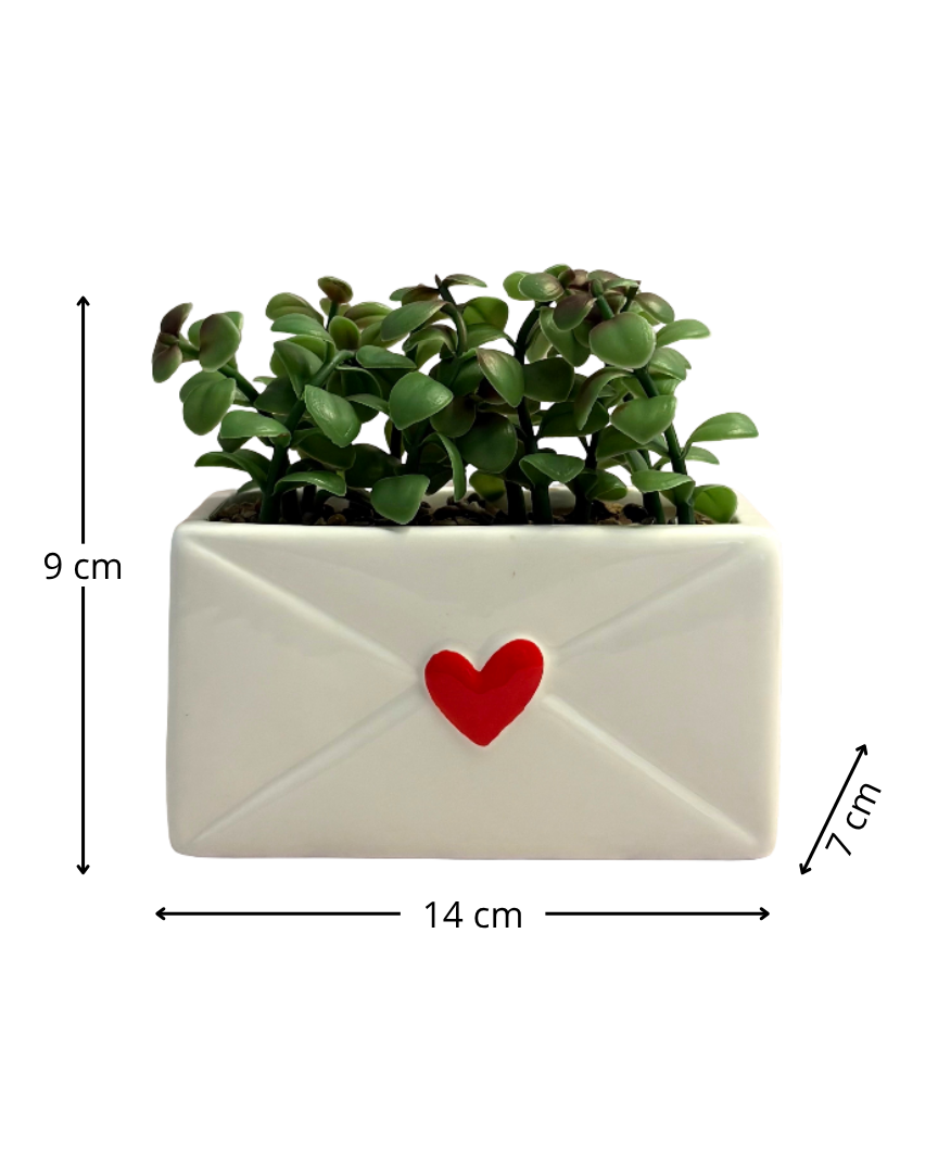 Maceta forma de sobre con planta artificial