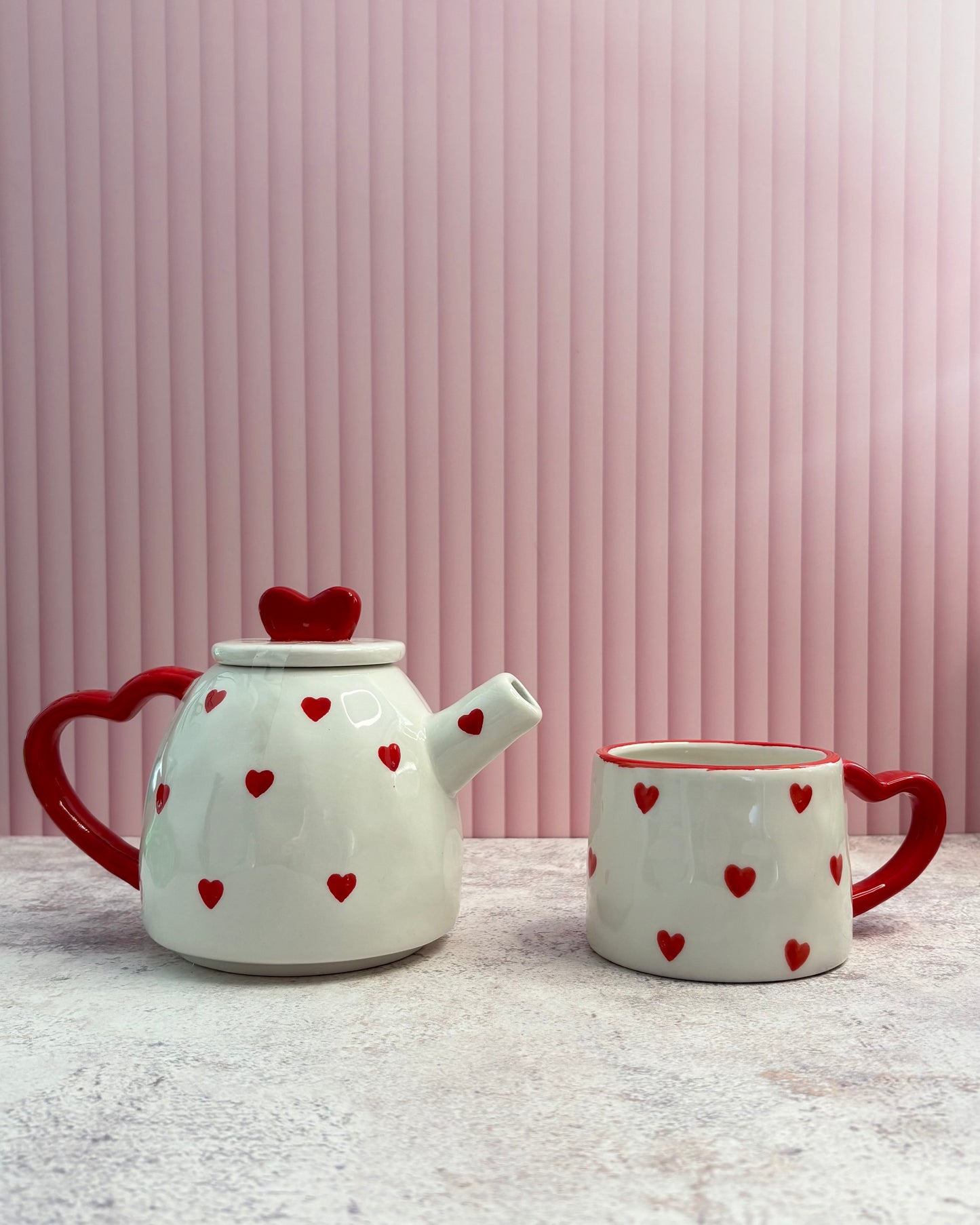 Set de tetera decorativa y taza de cerámica