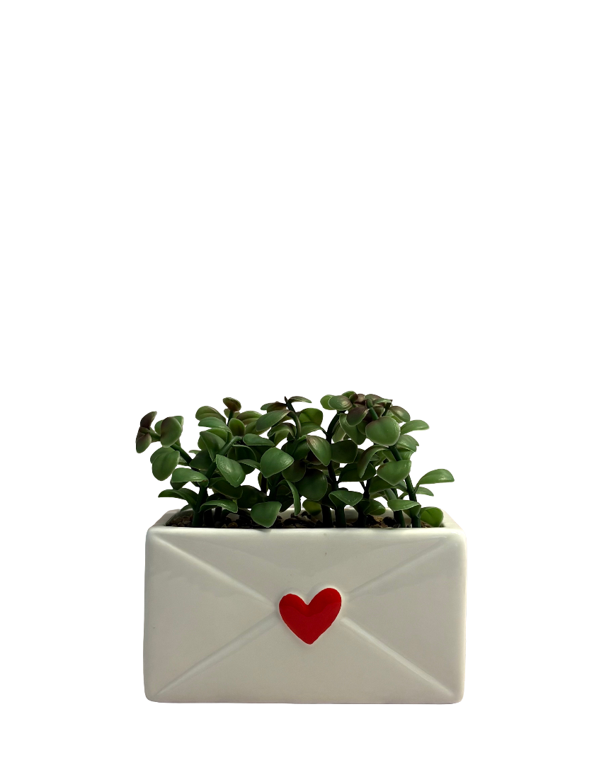 Maceta forma de sobre con planta artificial